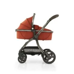 Egg2 Luxury Shell I-SIZE Bundle - Paprika -Baby Products Store egg2 paprika side view carrycot on chassis